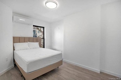 Turnkey, four-story two-family townhouse with cellar, offering - photo 9