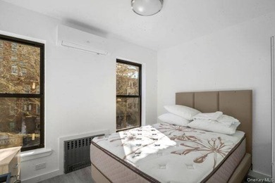 Turnkey, four-story two-family townhouse with cellar, offering - photo 10