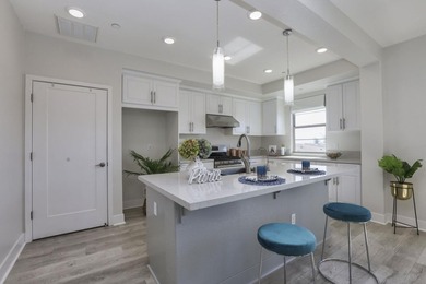 Welcome to 1089 Dewberry Place #401, a stunning top-floor corner - photo 13