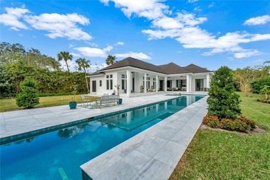 Located in Riomar Bay II, this 3 BD/4.5 BA residence blends - photo 2