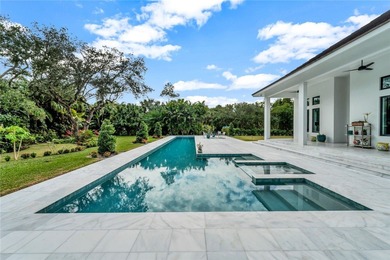 Located in Riomar Bay II, this 3 BD/4.5 BA residence blends - photo 3