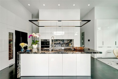 Located in Riomar Bay II, this 3 BD/4.5 BA residence blends - photo 8