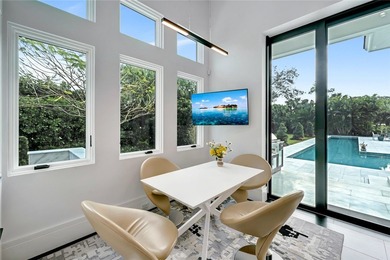 Located in Riomar Bay II, this 3 BD/4.5 BA residence blends - photo 10