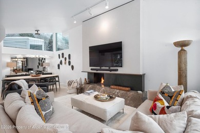 Settle into the Aspen lifestyle from this inviting three-bedroom - photo 1