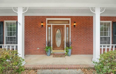 This classic Southern house sits on a corner lot in the heart of - photo 3