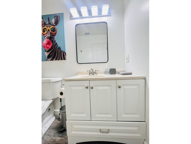 Home 2 BR 2 BA + Garage + Florida Room. Located in the heart of - photo 11
