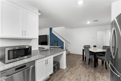 Welcome to this unique corner-unit townhome that seamlessly