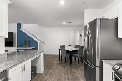 Welcome to this unique corner-unit townhome that seamlessly