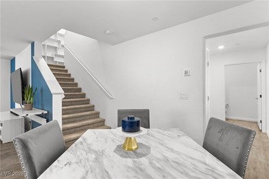 Welcome to this unique corner-unit townhome that seamlessly