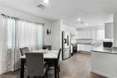 Welcome to this unique corner-unit townhome that seamlessly