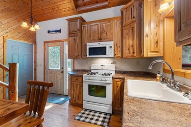 Experience the best of Northwoods living in a desirable home on - photo 30