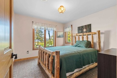Experience the best of Northwoods living in a desirable home on - photo 49