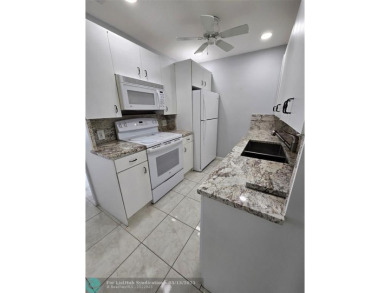 Lake Condo For Sale in Deerfield Beach, Florida