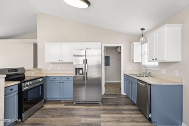 Welcome to coastal living in Panama City Beach! This 3-bedroom - photo 4