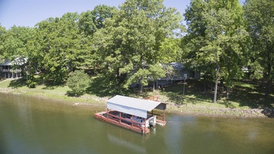 This charming 3-bedroom, 2.5-bath lakefront home sits on Lake - photo 24
