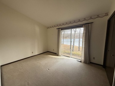This charming 3-bedroom, 2.5-bath lakefront home sits on Lake - photo 31
