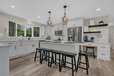 Escape to the lake's most coveted sandy shoreline with this - photo 2