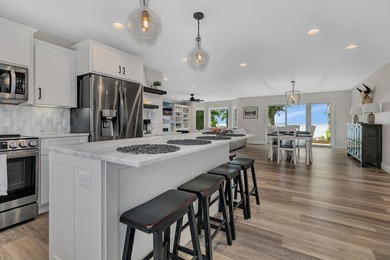 Escape to the lake's most coveted sandy shoreline with this - photo 3