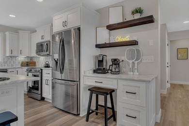 Escape to the lake's most coveted sandy shoreline with this - photo 4