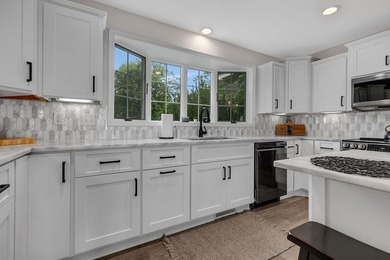 Escape to the lake's most coveted sandy shoreline with this - photo 5