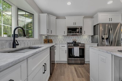 Escape to the lake's most coveted sandy shoreline with this - photo 6