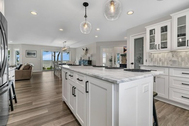 Escape to the lake's most coveted sandy shoreline with this - photo 8