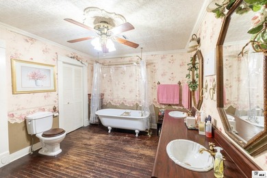 Located at 404 Filhiol Ave in West Monroe, this 3-bedroom - photo 12