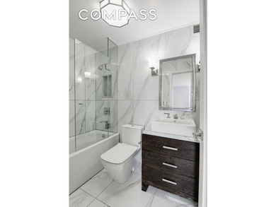 Exquisitely renovated and move-in ready, perched high on the - photo 11