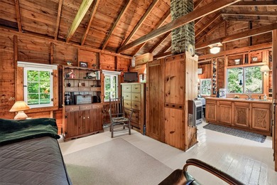 Discover your perfect escape on Mantrap Lake, one of the area's - photo 8