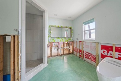 This home was water damaged by Hurricane Helene but has been - photo 32