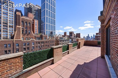 A penthouse of exceptional scale and presence, set atop one of - photo 1
