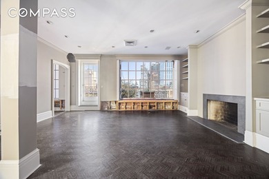 A penthouse of exceptional scale and presence, set atop one of - photo 3