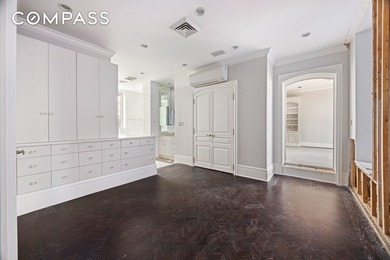A penthouse of exceptional scale and presence, set atop one of - photo 6