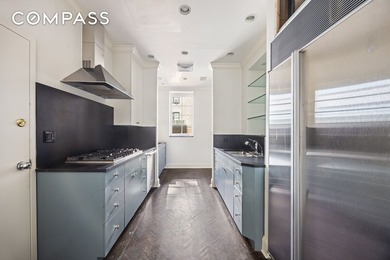 A penthouse of exceptional scale and presence, set atop one of - photo 8