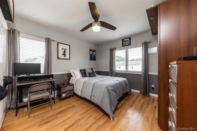 Custom-built Oceanside Colonial with 4 bedrooms, 2.5 baths and - photo 10