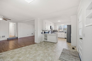 Welcome home to the charming 3-bedroom, 2-bath brick ranch on a