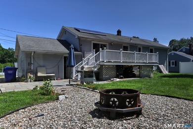 Welcome to this beautiful raised ranch located on a quiet street - photo 6