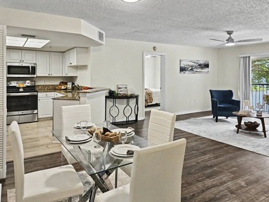 LAKE VIEWS, A PRIVATE GARAGE, AND RESORT-STYLE AMENITIES IN THE - photo 4