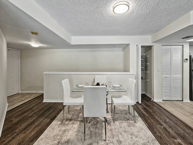 LAKE VIEWS, A PRIVATE GARAGE, AND RESORT-STYLE AMENITIES IN THE - photo 6