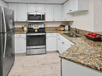 LAKE VIEWS, A PRIVATE GARAGE, AND RESORT-STYLE AMENITIES IN THE - photo 7