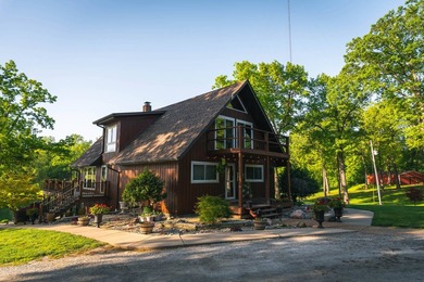 This 4-bedroom, 2.5-bath, 3,696-square-foot home sits on 21 - photo 2
