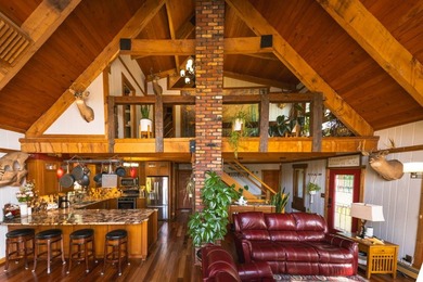 This 4-bedroom, 2.5-bath, 3,696-square-foot home sits on 21 - photo 4
