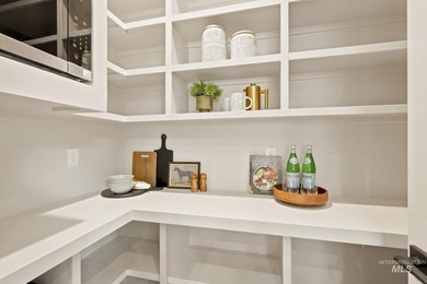 Nestled on a private, majestic wooded lot, this exquisite - photo 6