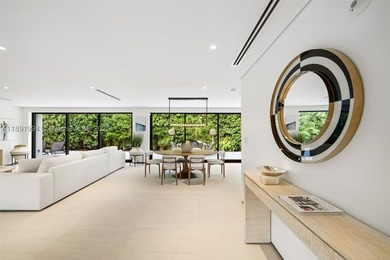Exquisite home on a coveted corner lot on Rivo Alto in the - photo 2