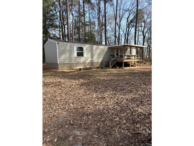 Enjoy easy lake living in this well-kept 2020 single wide mobile - photo 1