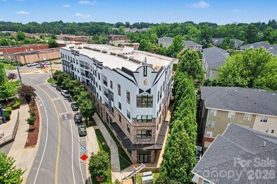 Perched on the top floor of one of NoDa's most coveted addresses - photo 1
