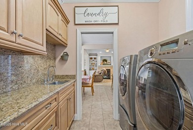 UPDATED PICTURES!! Enjoy exceptional golf course living from - photo 31