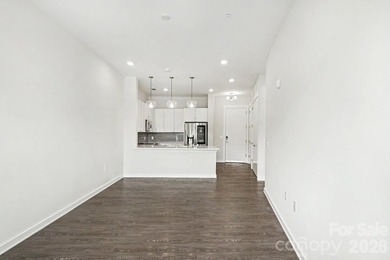 Perched on the top floor of one of NoDa's most coveted addresses - photo 3