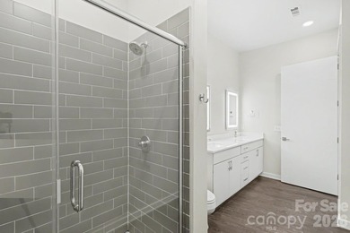 Perched on the top floor of one of NoDa's most coveted addresses - photo 8