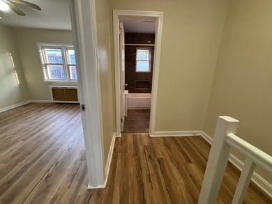 This Well-maintained 2-Family Brick Townhouse is For Sale in - photo 12